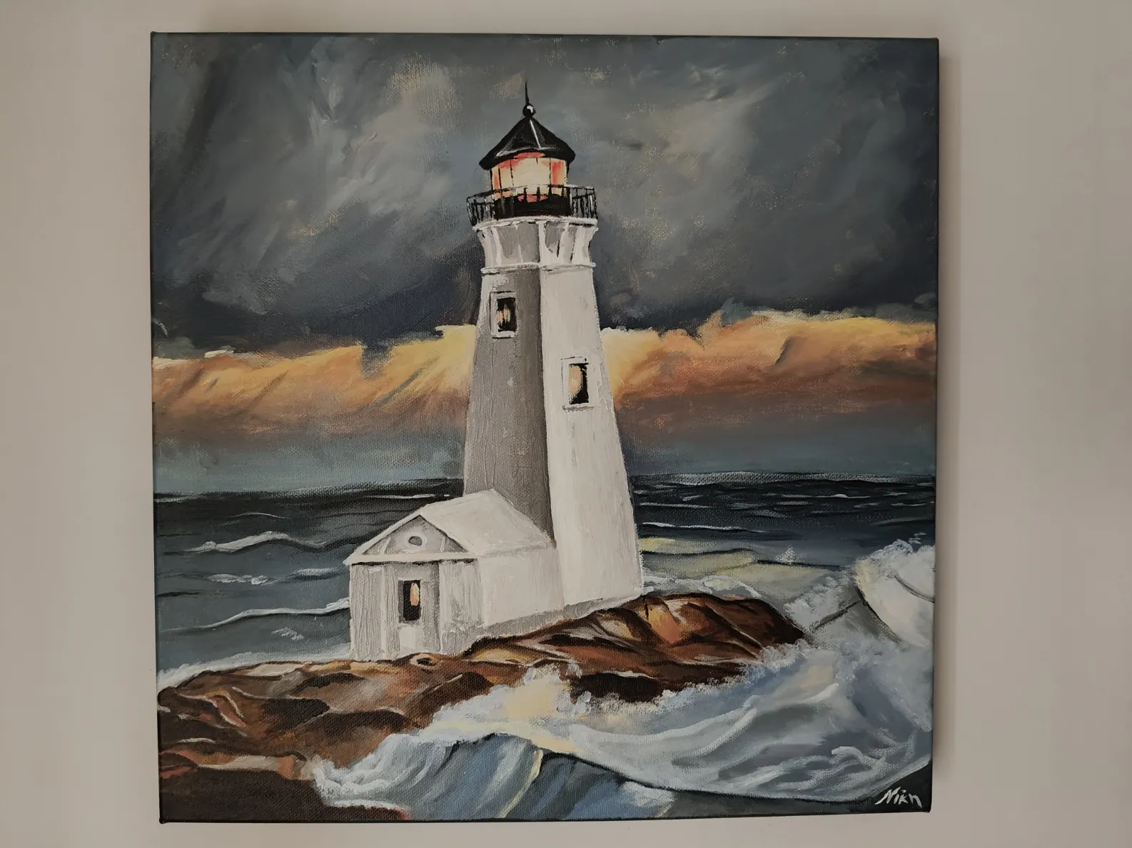 A white lighthouse against a dark sky and breaking waves